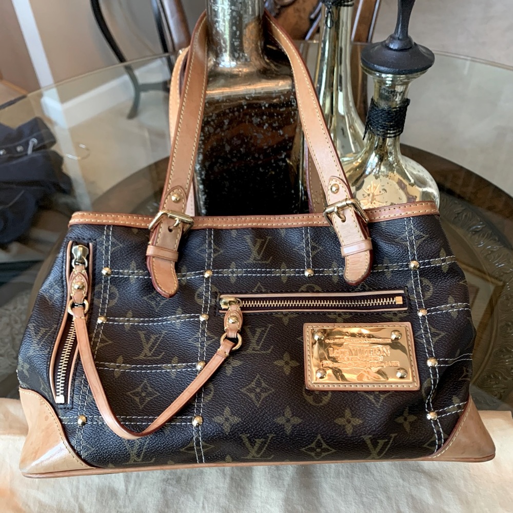 Louis Vuitton Riveting purse